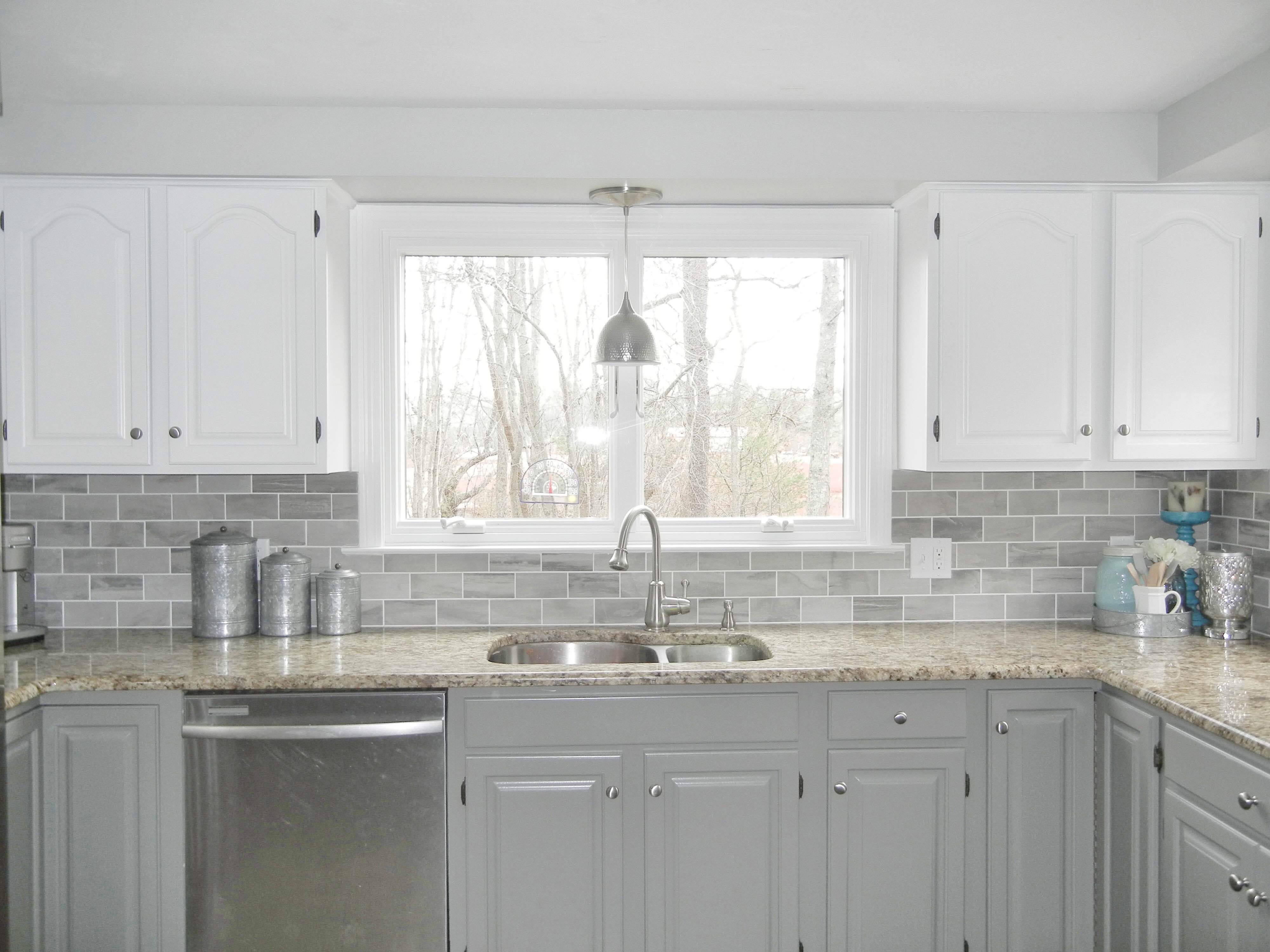 Oak Kitchen Makeover - 2 toned gray and white cabinets and gray subway tile (for under $2000!) GinaKirk.com