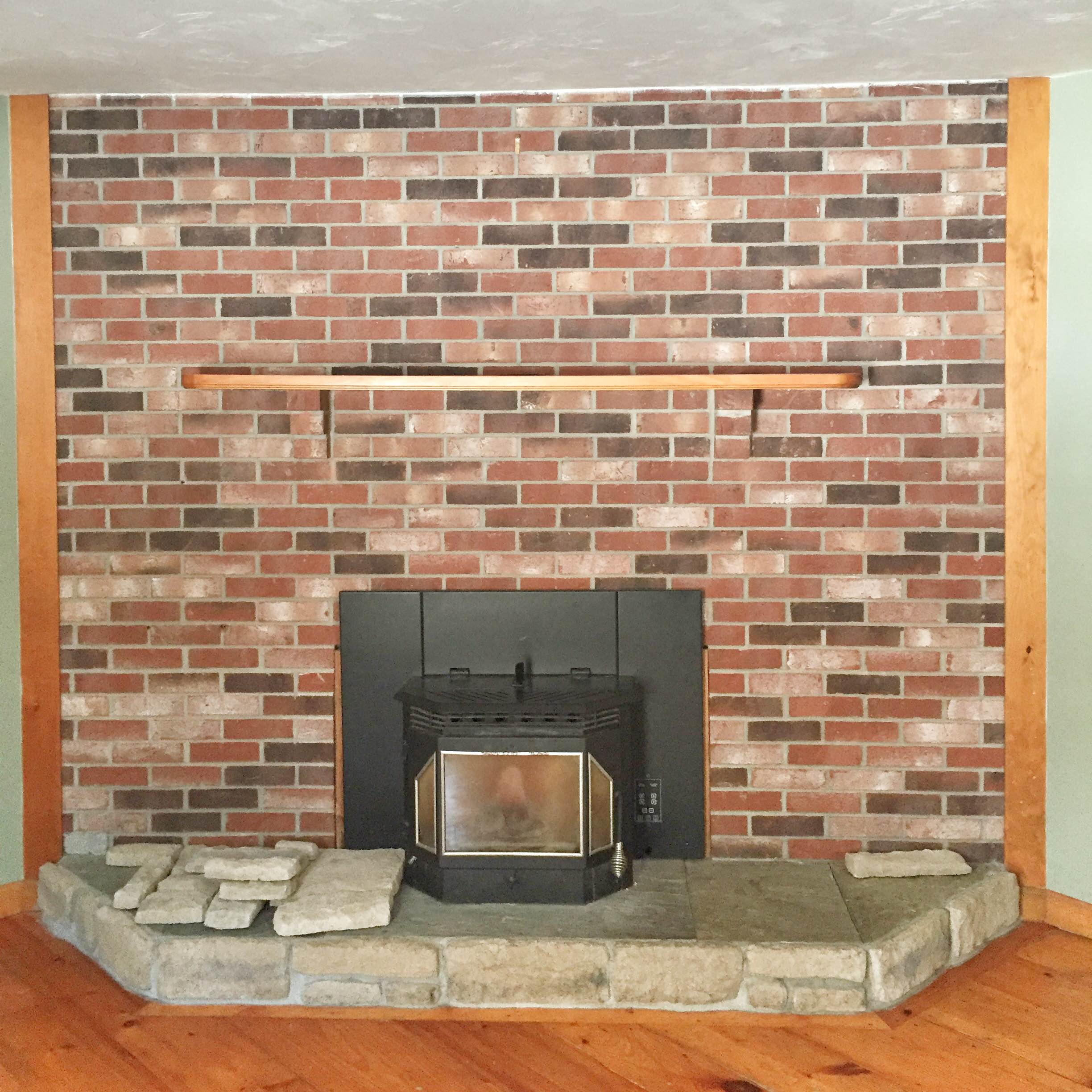 Brick fireplace makeover | Brick to stone veneer fireplace makeover | How to do a stone veneer fire place | GinaKirk.com