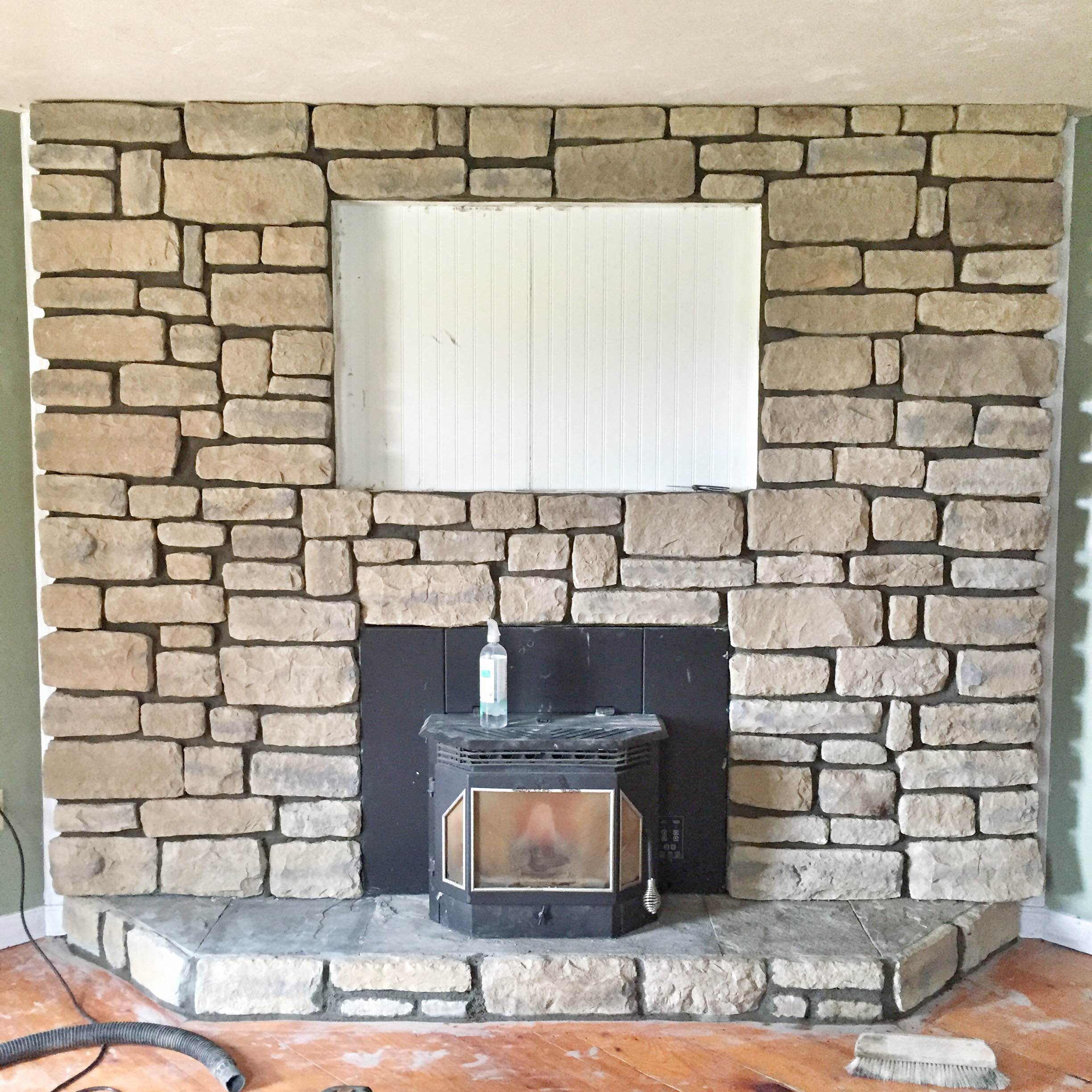 Brick fireplace makeover | Brick to stone veneer fireplace makeover | How to do a stone veneer fire place | GinaKirk.com